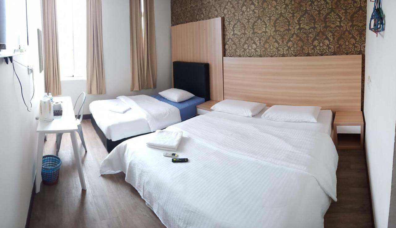 Hotel Truly Asia Kota Kinabalu Quarto foto